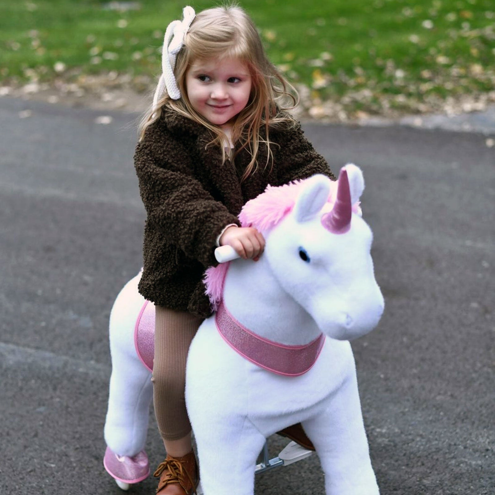 Pink unicorn sales ride on toy